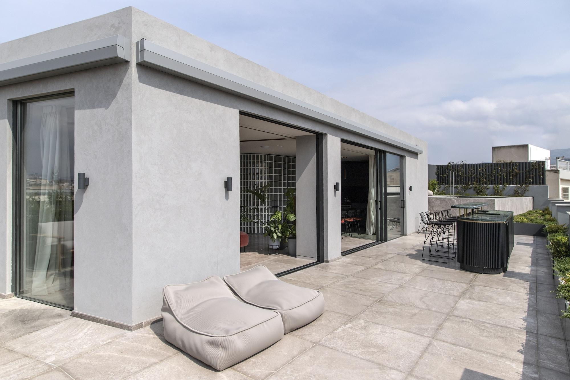 Perianth Hotel Athena Bagian luar foto Rooftop terrace
