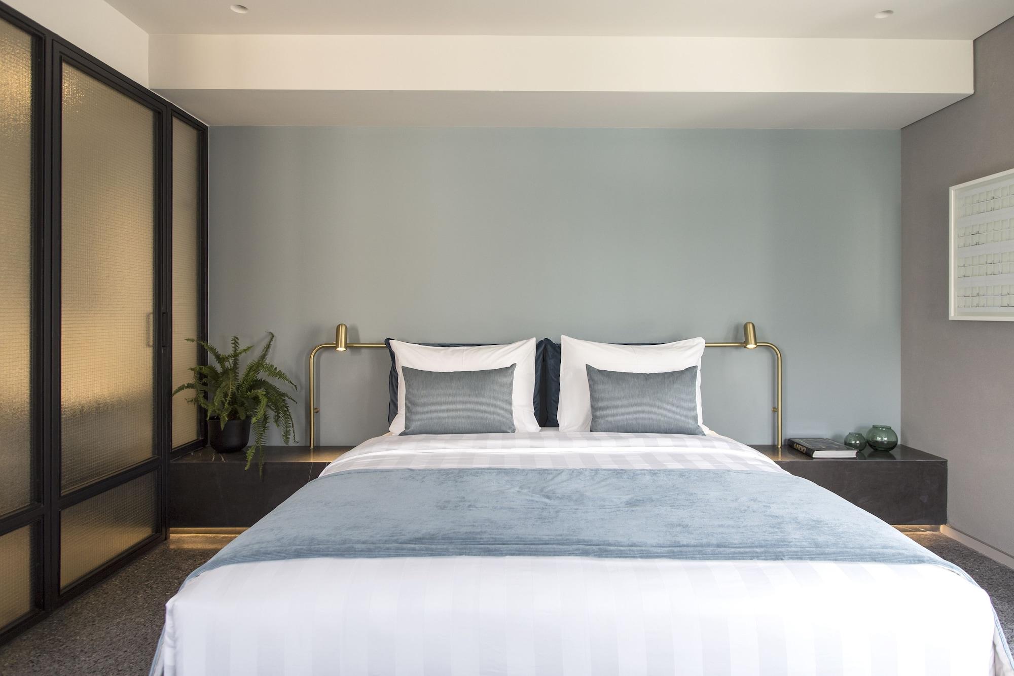 Perianth Hotel Athena Bagian luar foto A bedroom at the hotel