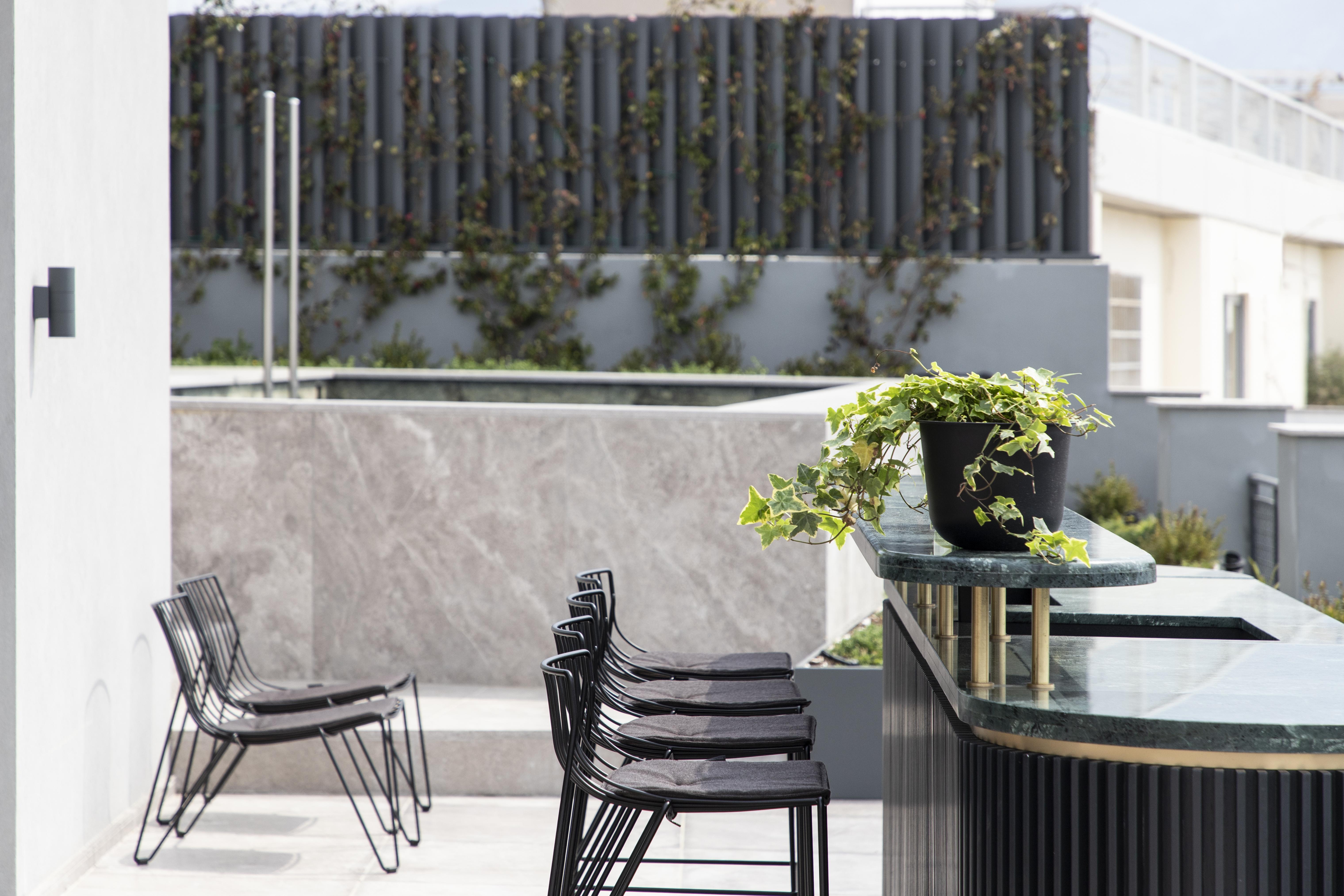 Perianth Hotel Athena Bagian luar foto The rooftop bar at the hotel