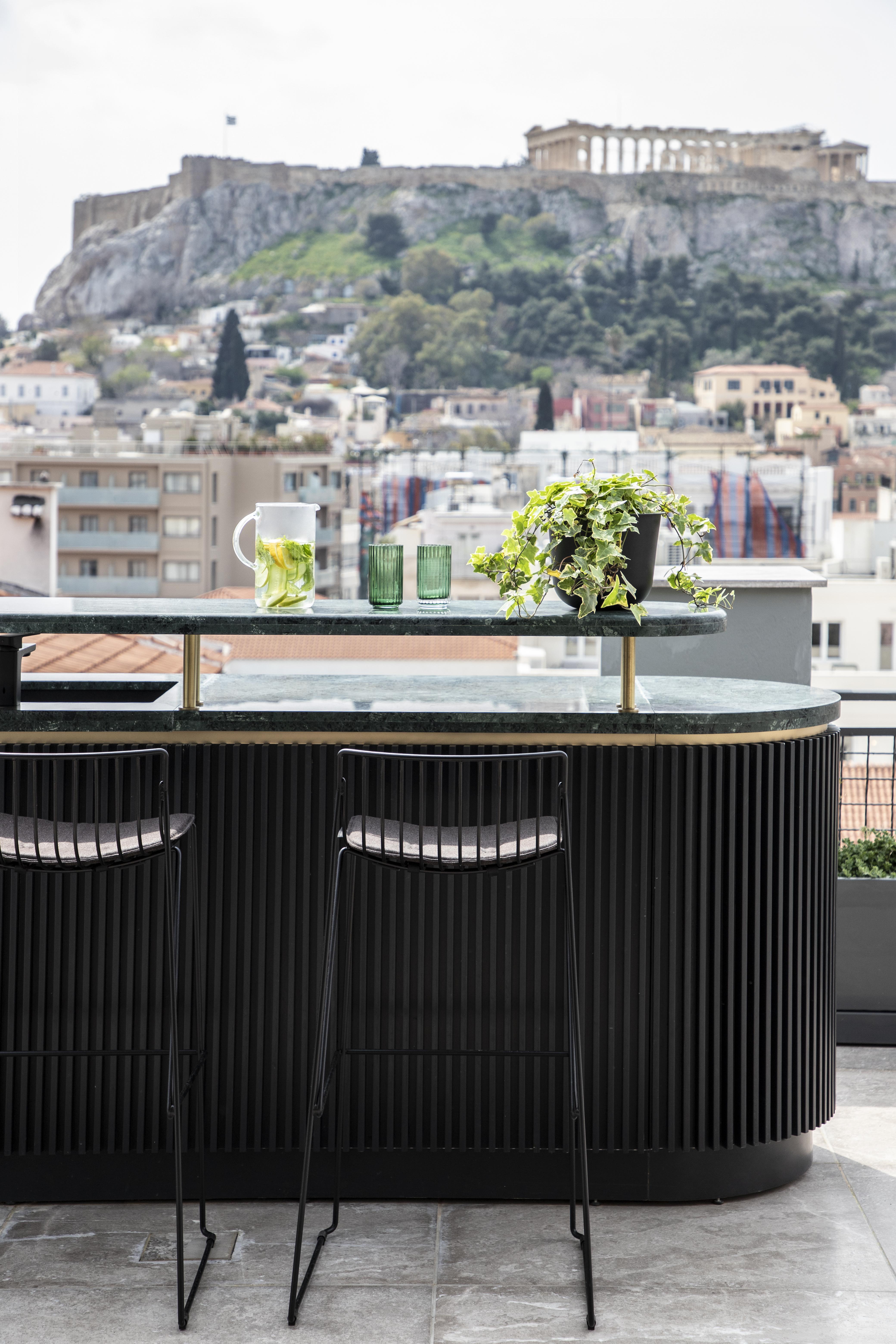 Perianth Hotel Athena Bagian luar foto A balcony