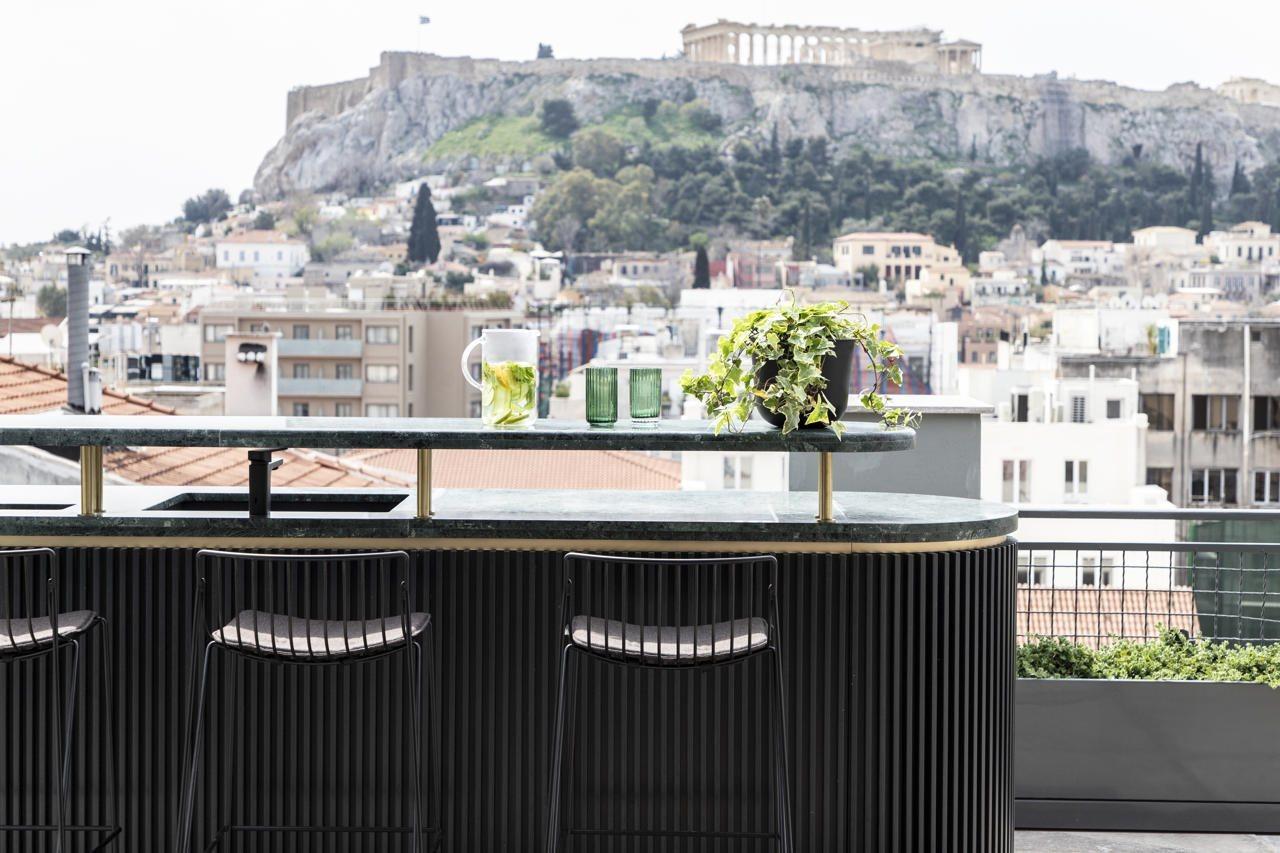 Perianth Hotel Athena Bagian luar foto The view from the bar