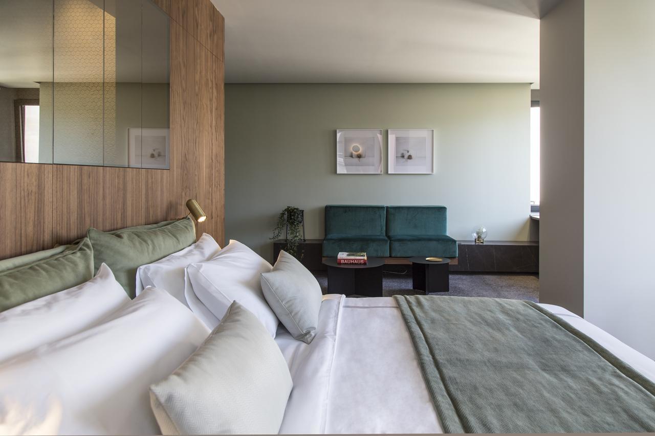 Perianth Hotel Athena Bagian luar foto A bedroom at the hotel