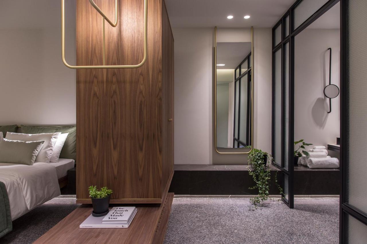 Perianth Hotel Athena Bagian luar foto The interior of a bedroom at The Standard East Village