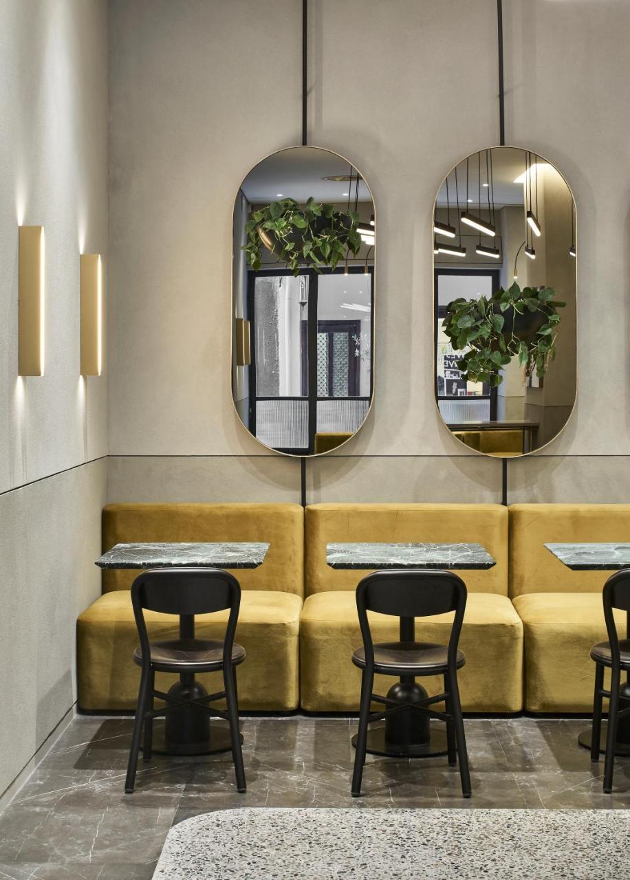 Perianth Hotel Athena Bagian luar foto Interior of the restaurant