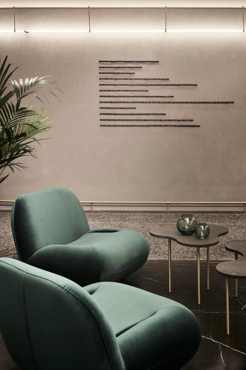 Perianth Hotel Athena Bagian luar foto The interior of the hotel