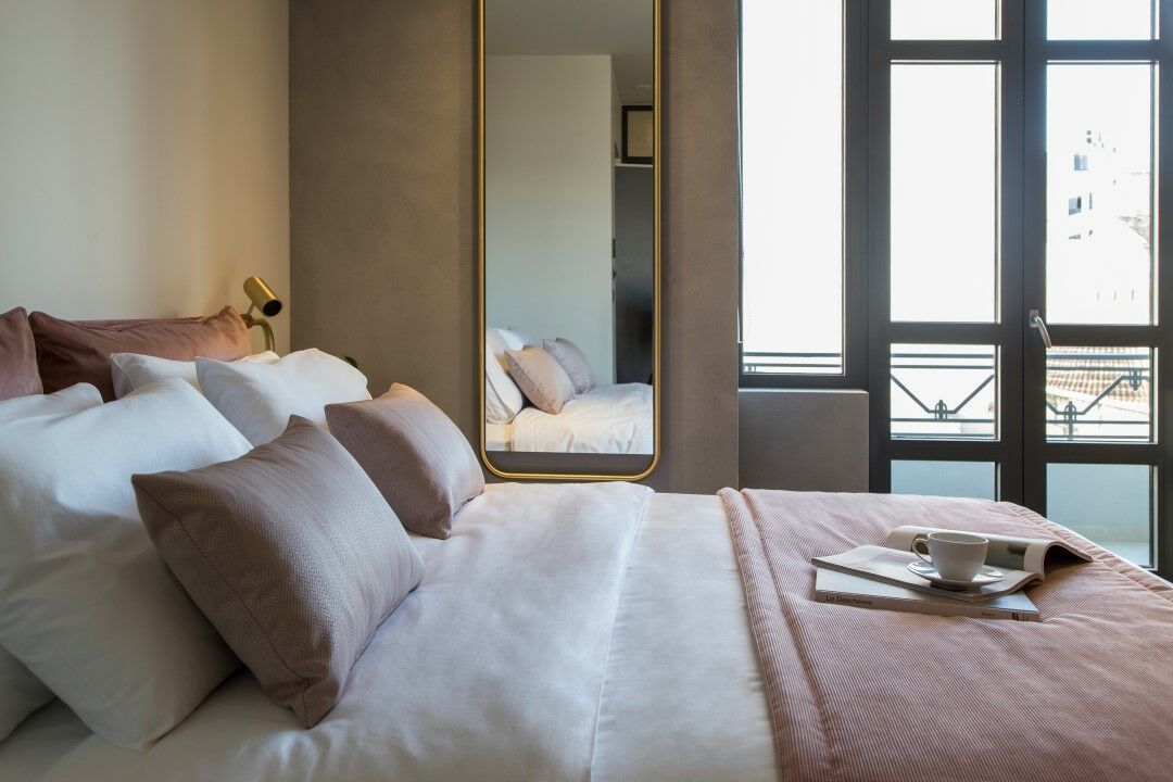 Perianth Hotel Athena Bagian luar foto A bedroom at the hotel